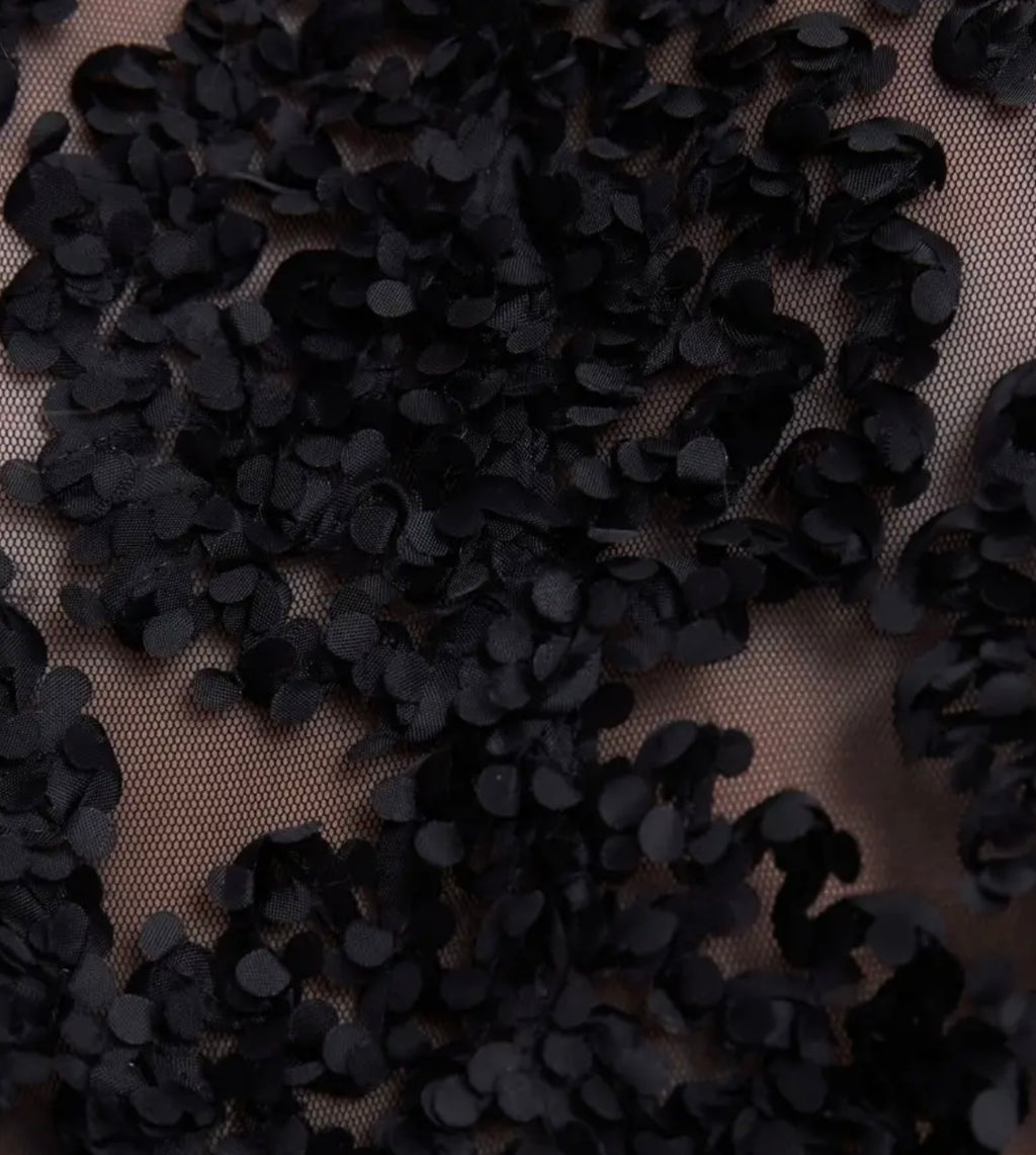 Blouse texturée à rosaces